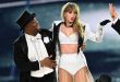 Travis Kelce shows support for Taylor Swift's dancer after he fell onstage