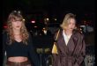 Taylor Swift puts on a leggy display in a mini skirt and as she skips Travis Kelce's game for a girls' night out